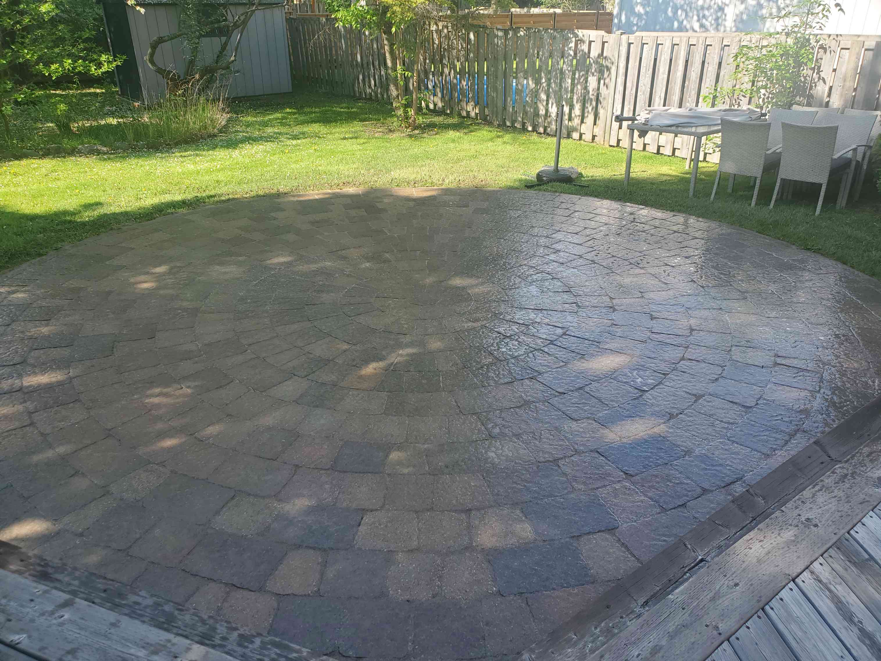 Sealed paver driveway with a glossy protective finish